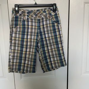 blue, yellow, and white plaid capris